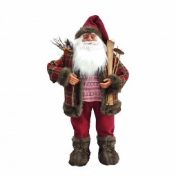 クリスマスギフトの飾り、ツリー、ぶら下がっている豪華な古典的なサンタ人形、家の装飾