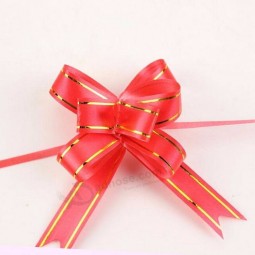 Neue heiße Weihnachtsgeschenkverpackung ziehen Bogenbänder dekorative Feiertagszugblumenbänder 10pcs / Lot