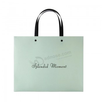 Bolsas de regalo con logotipo personalizado de alta calidad con impresión de asa Bolsa de papel de compras navideñas