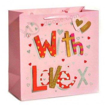 Campione gratuito Logo personalizzato Sacchetto di carta di cartone rosa di lusso con manico a nastro