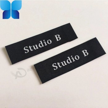 Etiqueta de ropa tejida con logotipo personalizado de alta densidad de la venta caliente del pliegue del extremo para la prenda