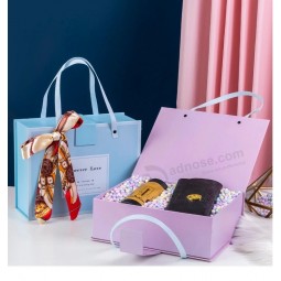 中国批发化妆品包装纸板纸礼盒带把手