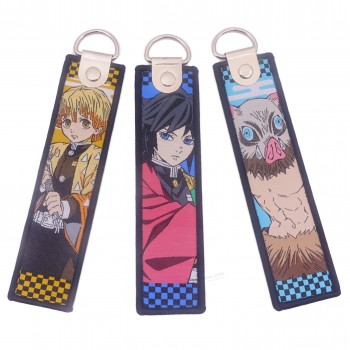 Pas de minimum personnalisé logo porte-clés broderie tissu tissé dessin animé porte-clés / marque porte-clés Jet Tag