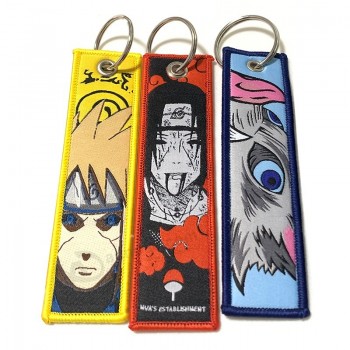 Op maat gemaakt geweven logo Jet Tag sleutelhanger sublimatie stof sleutelhanger motorfiets auto anime sleutelhangers