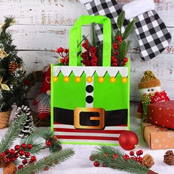 Paquet de 12 sacs non tissés de Noël 9,8 x 7,8 x 9,8 pouces Père Noël Elfes Costume Impressions Noël Cadeaux de Noël Cadeau de fête Sac de fête non tissé Gâterie