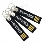 Goedkope op maat gemaakte stof Pre-take-off ontmanteling sleutelhanger sleutelhanger dubbelzijdig logo geweven label borduurwerk sleutelhanger