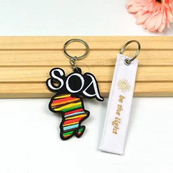 Logo promozionale personalizzato Anime rimuovere prima di un equipaggio di volo doppio lato tessuto tessuto ricamo ricamato chiave Jet Tag portachiavi