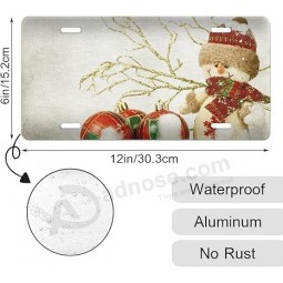 Placas de matrícula delanteras de coche de muñeco de nieve de alta gama personalizadas Muñeco de nieve de invierno y bolas de Navidad rojas Placas de vanidad de aluminio con etique